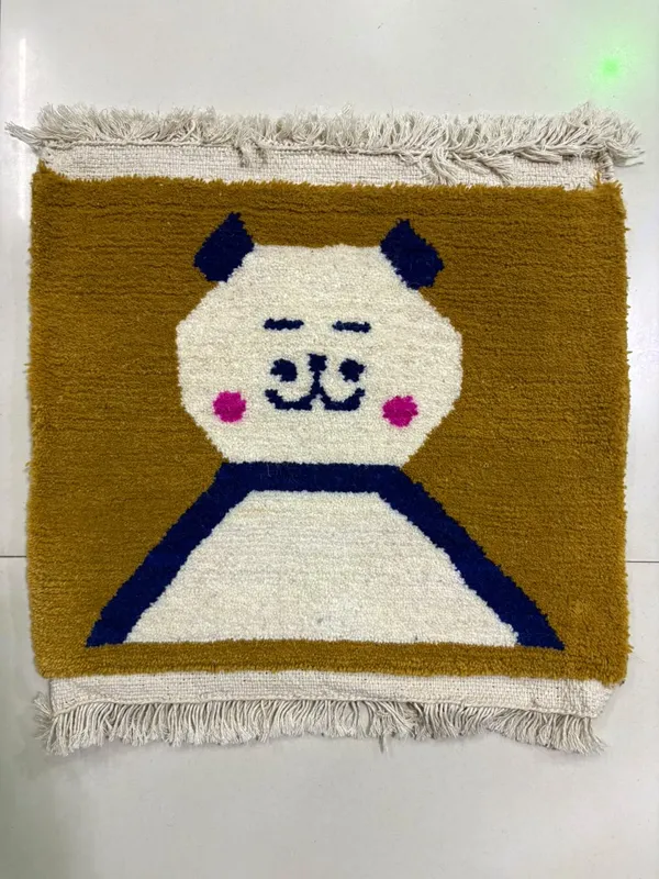 Cat in ochre — A smiling cat outlined in indigo