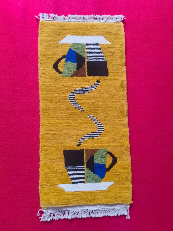 Two cups — Facing cups, a coil of steam between