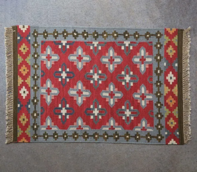 Red lattice — Interlocking angular forms within a diamond border